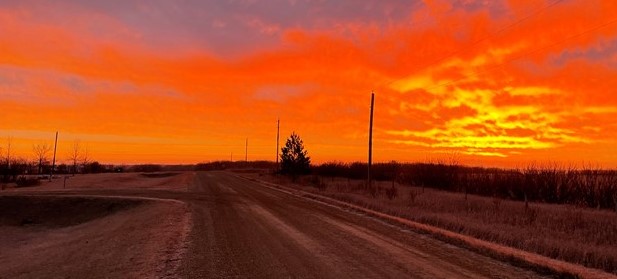 Gravel road and a sunset